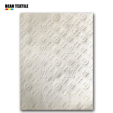 Load image into Gallery viewer, White embossed Louis Vuitton Faux leather fabric by yard car upholstery