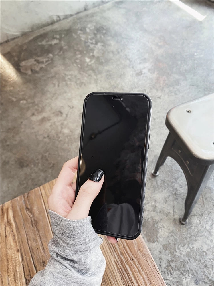 Étui pour iPhone en cuir sculpté avec logo classique COACH.