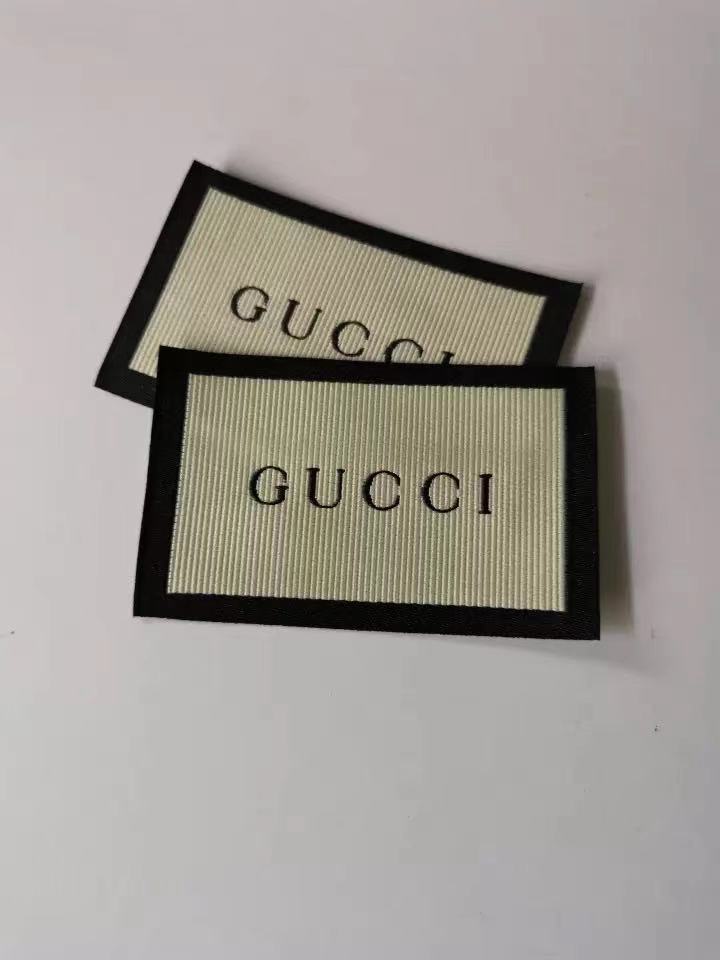 Étiquettes de la marque Gucci