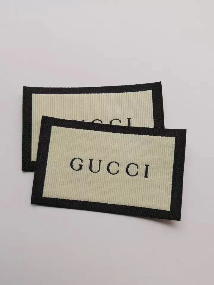 Étiquettes de la marque Gucci