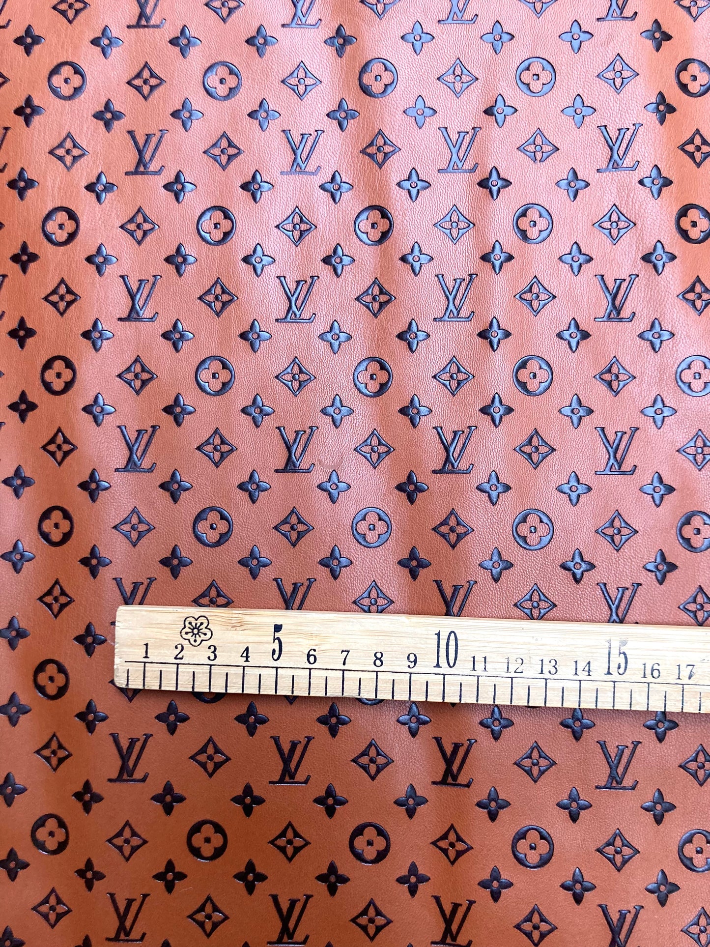 Custom Small Letter Brown LV Embossed Handmade Leather Upholstery